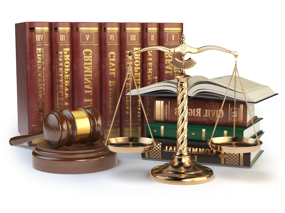 Gold scales of justice, gavel and books with differents ...