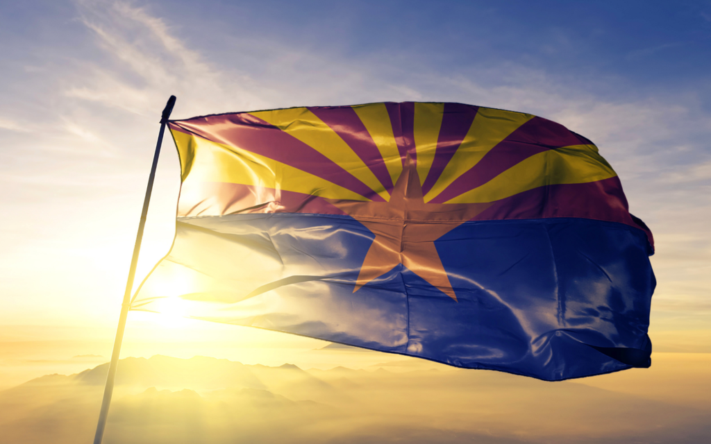 The Arizona state flag during a sunset.