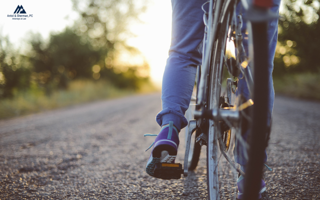 Close up of a person on a bike on a trail