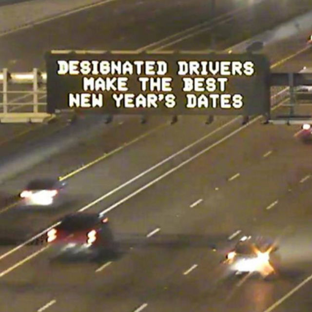 ADOT freeway sign that says, "Designated drivers make the best New Year's dates"