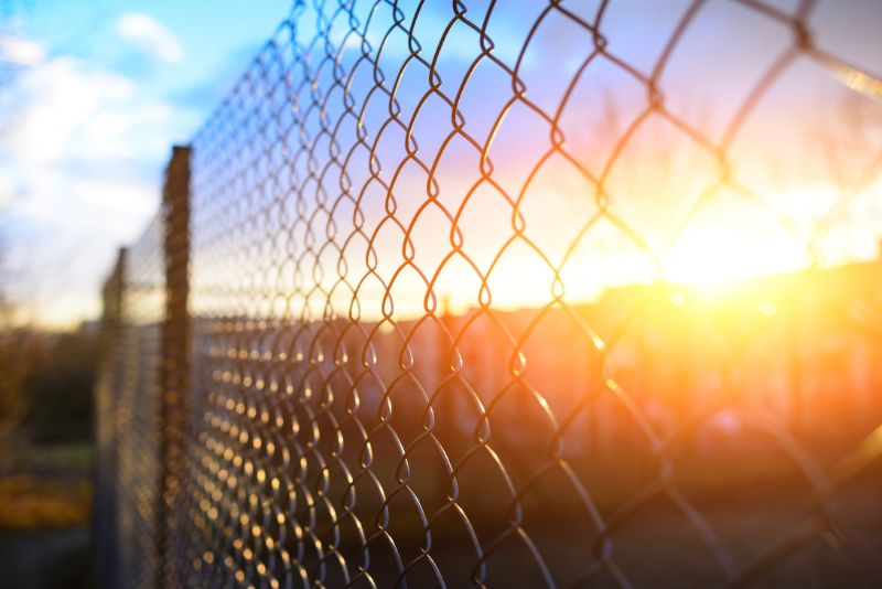 Chain Link Fence at Sunset