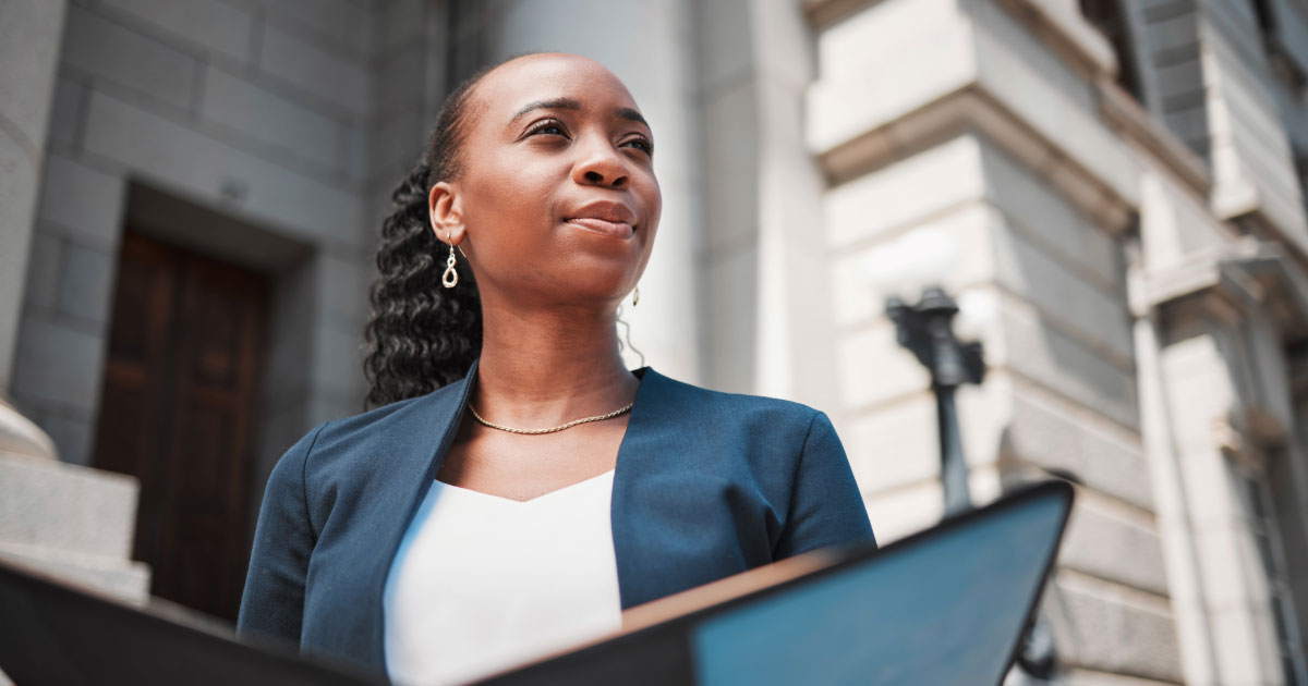 Woman standing outside courtroom after hearing