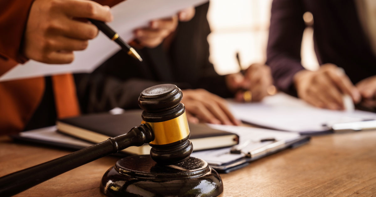 Lawyers looking over the evidence of a car accident case